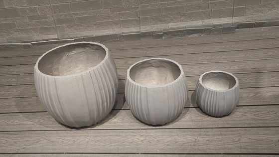 kopen Moderne ronde handgesneden decorplanten voor binnen- en buitenhoteldecoratie online manufacture