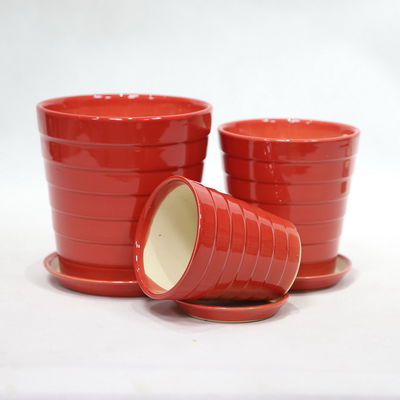 Ronde lichte keramische planters met afvoergat