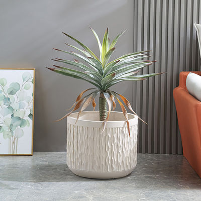 Verbazingwekkende plantenvertoning met kleiplanters van glasvezel Duurzaam en stijlvol