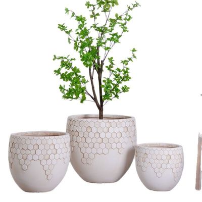 Prosperiteit Honingraat Structuur Patroon Neutrale Beige Ronde Glasvezel Planter Decoratie